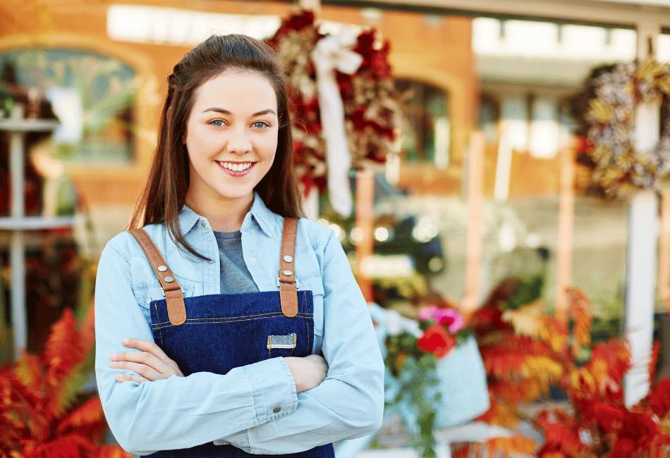 Woman standing outside of a shop